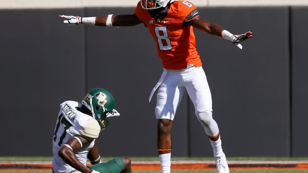 Oklahoma State's Rodarius Williams (8) was drafted by the New York Giants in the sixth round of the NFL Draft on Saturday.
